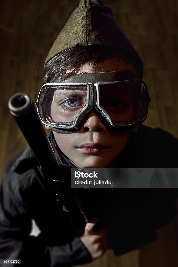 Little Boy with a Gun Little Boy with a Weapon in the glasses Boys Stock Photo