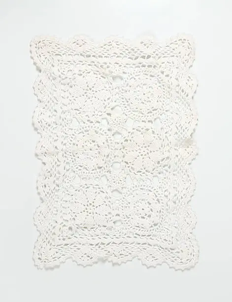 Photo of white lace place mat