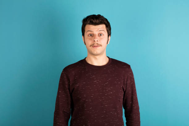 istock Portrait of young confused man. 629112872