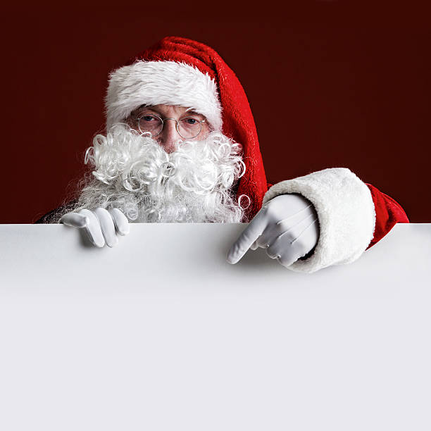 istock Santa Claus with big blank card 629128698