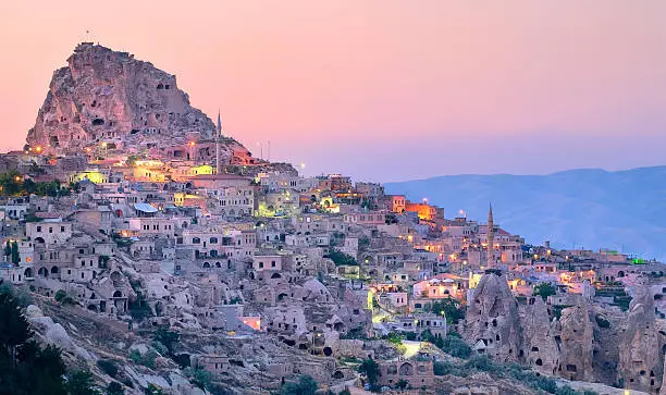 Uchisar cave city in Cappadocia, Nevsehir, Turkey on sunset