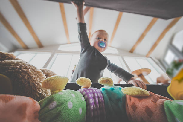 istock POV Baby Boy Opening Exploring and Looking Inside Toy Box 629129486