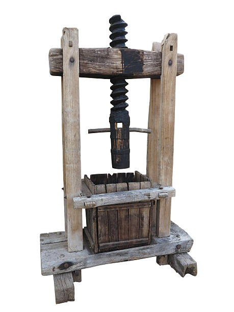 istock Ancient wooden wine old press isolated on white 629129632