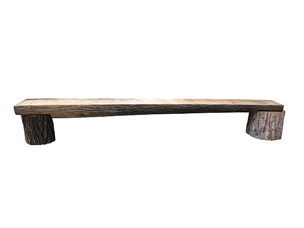 istock Wooden bench of rough plank and logs isolated over white 629129708