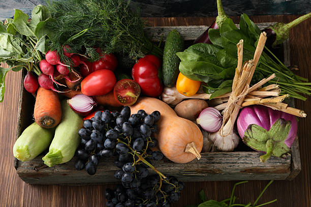 istock Farm vegetables in wood crate 629130802