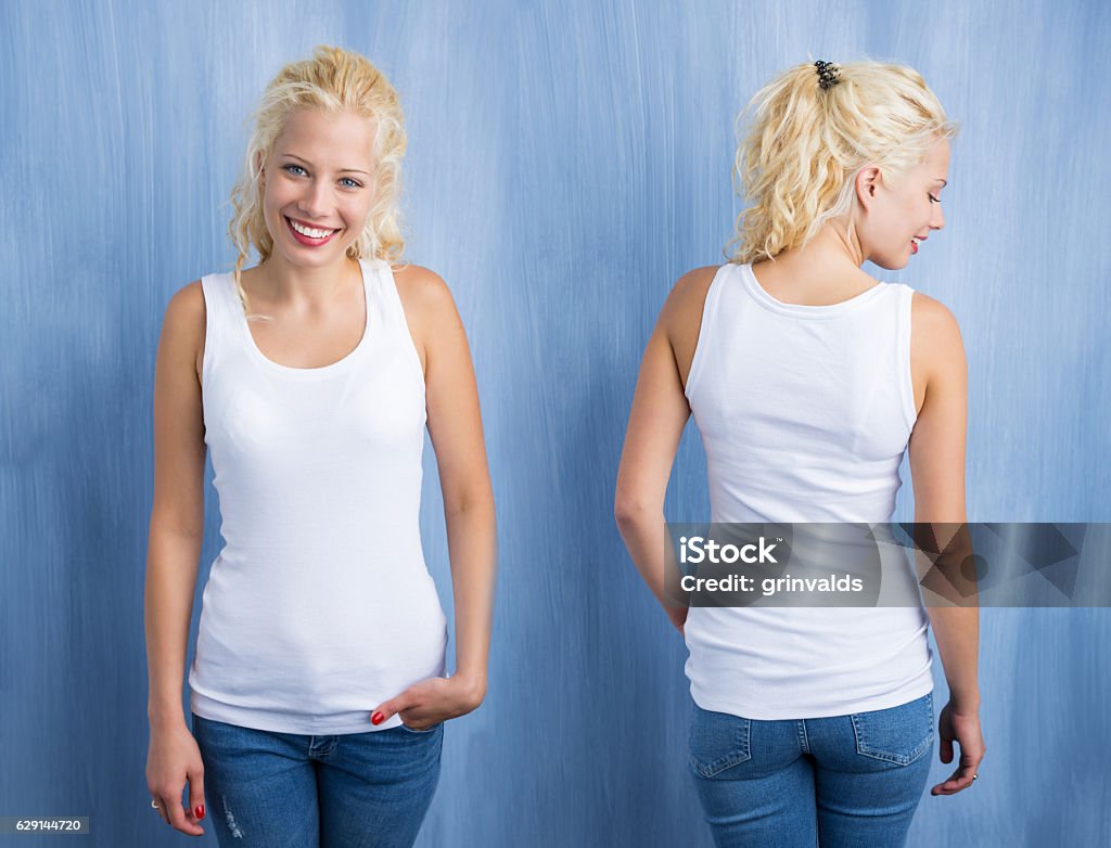 Woman in white tank top on blue background Armored Tank Stock Photo