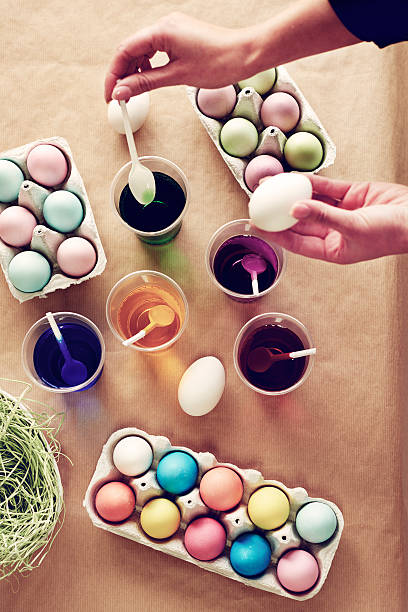 istock High angle view of coloring boiled eggs 629155854