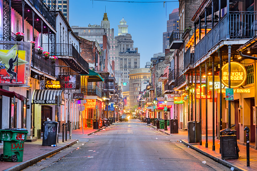 New Orleans, Louisiana, USA - May 10, 2016: Nightlife establishment line Bourbon Street in the early morning. The renown street is in the heart of the French Quarter.