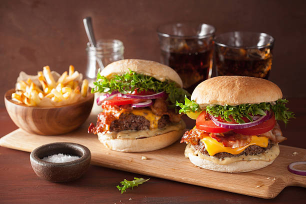 istock bacon cheese burger with beef patty tomato onion 629163826