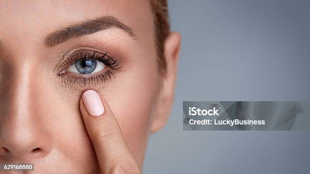 Wrinkles Around The Eyes Stock Photo - Download Image Now - Dry, Women, Wrinkled