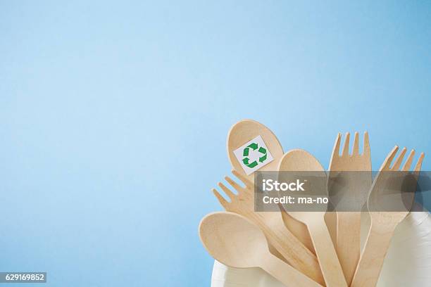 Wooden Spoons And Forks With Recycle Symbol Stock Photo - Download Image Now - Abstract, Copy Space, Crockery