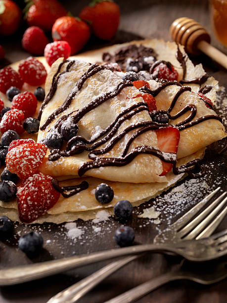 istock Crepes with Fresh Berries, Chocolate Sauce and Powdered sugar 629171762