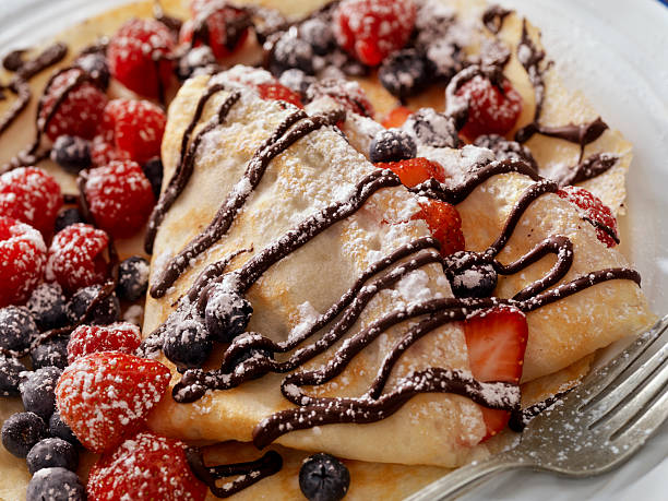 istock Crepes with Fresh Berries, Chocolate Sauce and Powdered sugar 629172118
