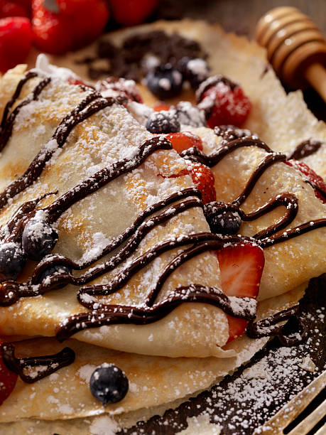 istock Crepes with Fresh Berries, Chocolate Sauce and Powdered sugar 629172510