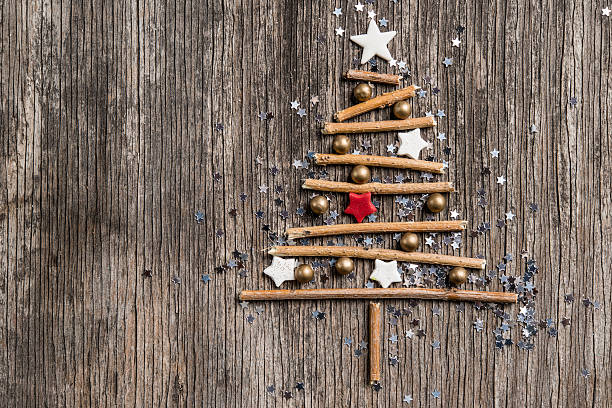 istock Christmas tree made of branches and golden pearls 629183080