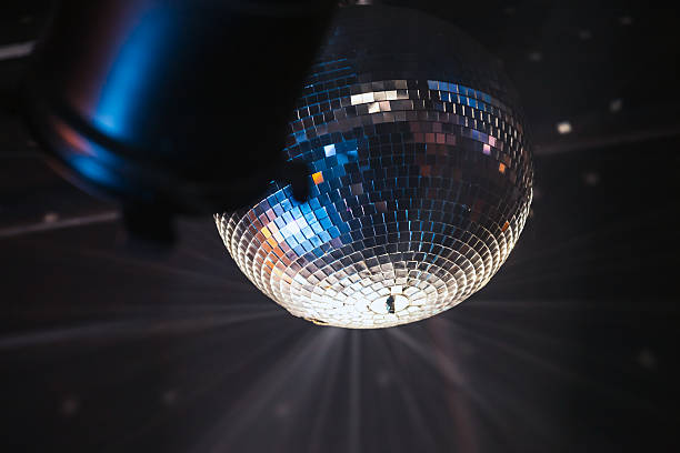 istock Disco ball near spot light, night party 629186630