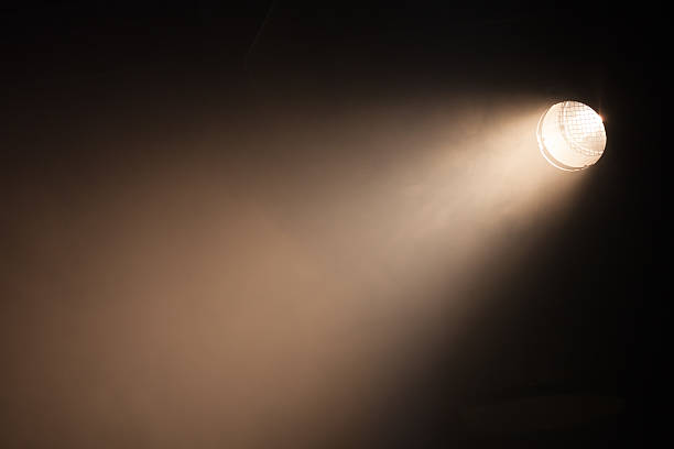 Ray of scenic spot light over dark
