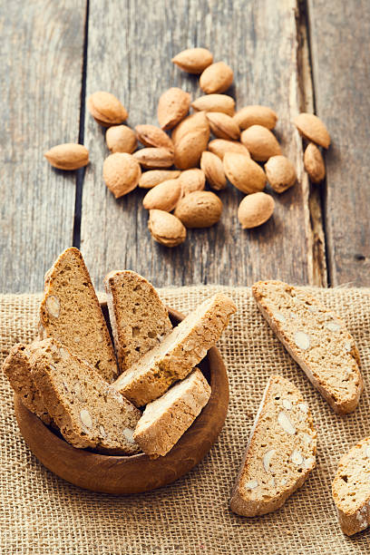 istock Cantucci in wooden bowl on wooden table. 629188056