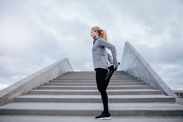 istock Fitness female stretching her leg 629188988