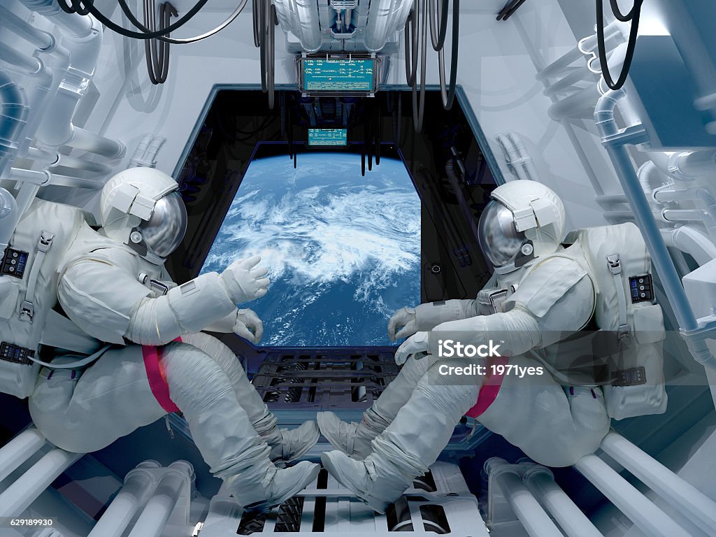 Group astronauts Group astronauts inside the spacecraft. Astronaut Stock Photo