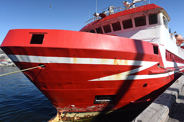 red fisherman ship at pier