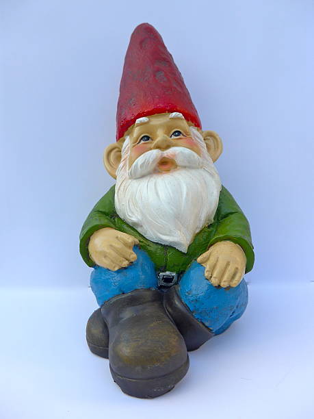 istock Garden dwarf with red hat, isolated on white background 629203050