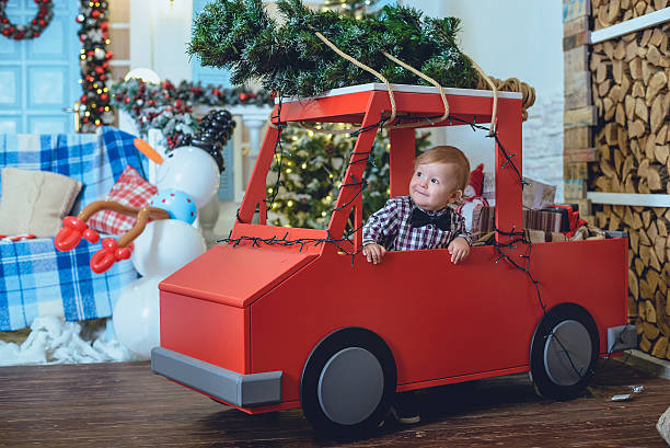 istock little kid near christmas tree 629203082