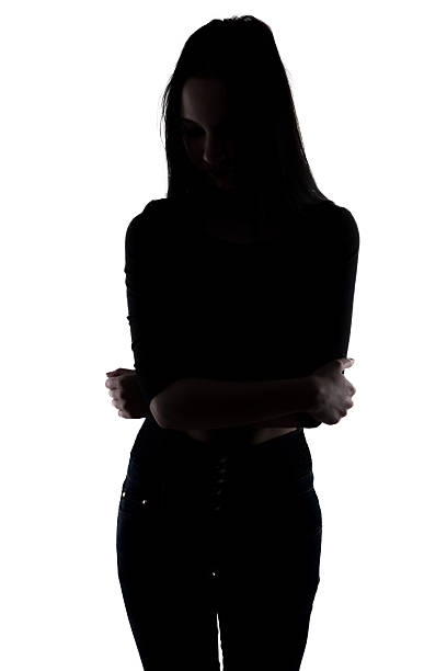 istock Silhouette slim woman with arms crossed 629210106