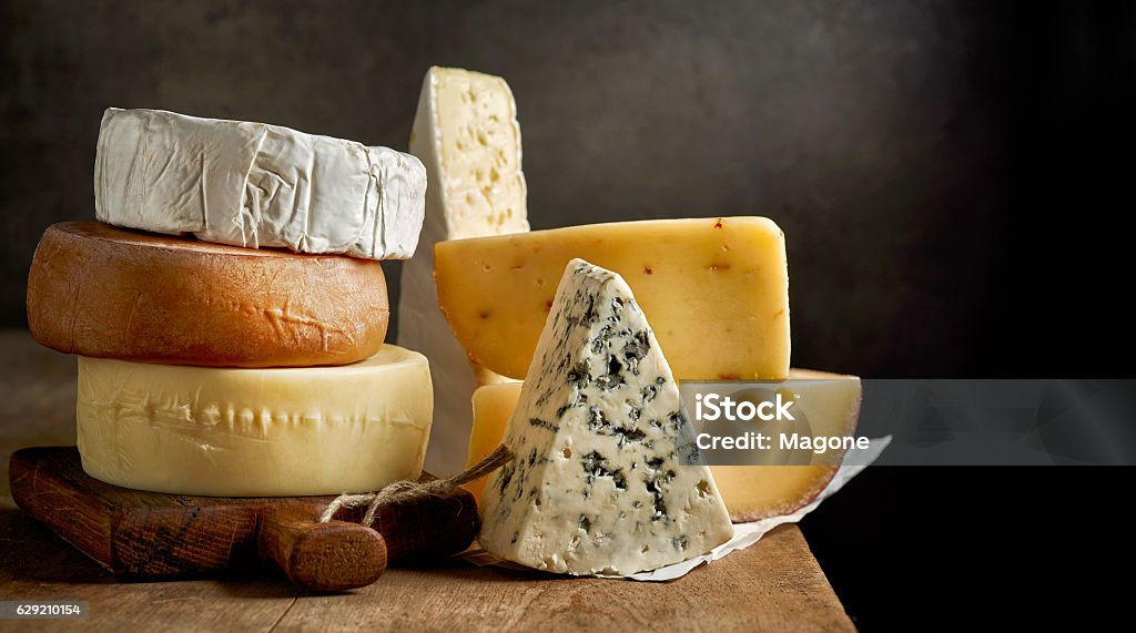 various types of cheese various types of cheese on rustic wooden table Cheese Stock Photo