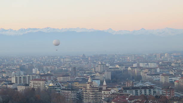 balloon over turin at sunset