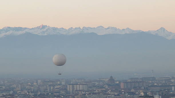balloon over turin at sunset