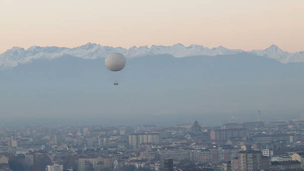 balloon over turin at sunset