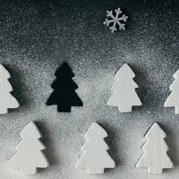 istock Christmas tree cookies with powder sugar on dark table. 629215132