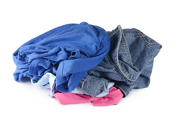istock Pile of clothes isolated on white 629215344