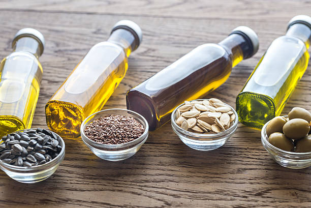 istock Bottles with different kinds of vegetable oil 629215518