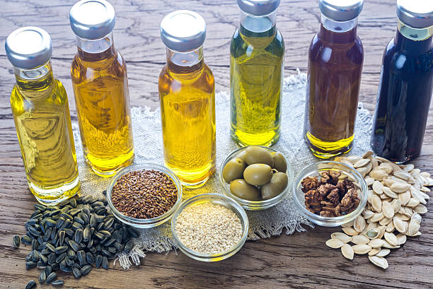 istock Bottles with different kinds of vegetable oil 629215626