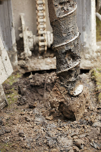 istock Closeup view of a large industrial drill while drilling. 629215678