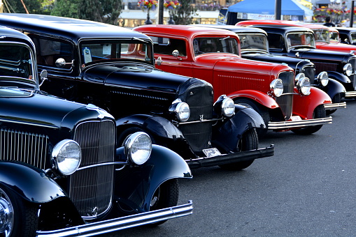 Victoria BC, Canada,July 21st 2013.Classic cars lined up in the street at the classic car show in Victoria.Pristeen classic autos show off their beauty, they have all aged suberbly.