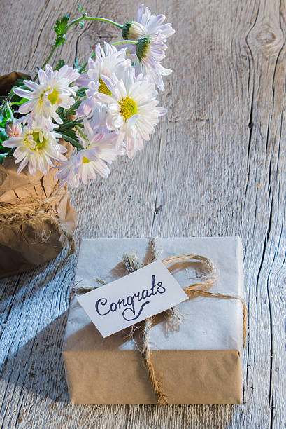 istock bouquet of white chrysanthemums and a gift 629218654