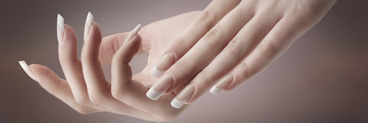 Female hands with beautiful french manicure