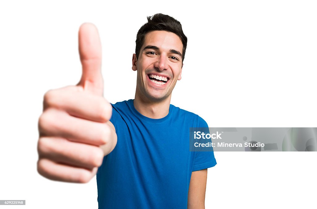 Funny man giving thumbs up Portrait of a funny man giving thumbs up Thumbs Up Stock Photo