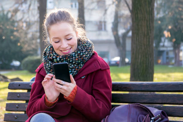 istock Urban city woman texting. 629237616
