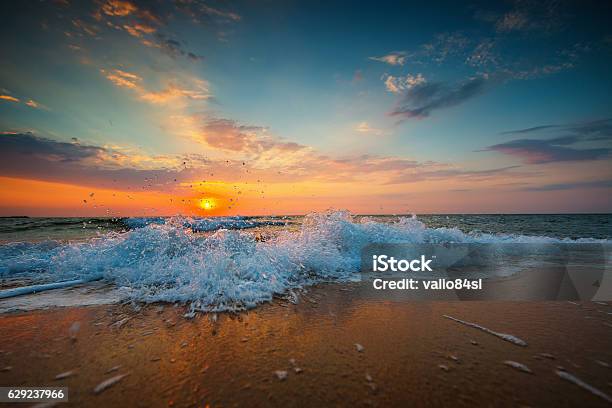 Sunrise Over The Beach Stock Photo - Download Image Now - Beach, Sunrise - Dawn, 2017