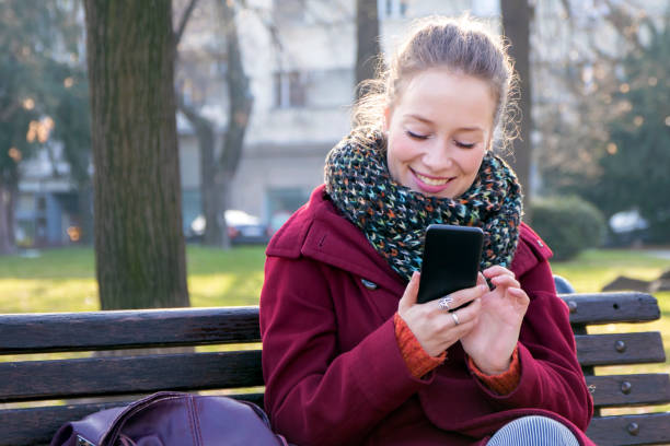 istock Urban city woman texting. 629237982