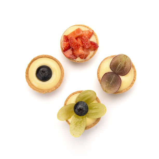 istock top view shot of various fruit tarts 629254506