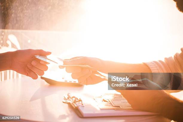 Hands Giving Receiving Money Stock Photo - Download Image Now - Currency, Exchanging, Receiving