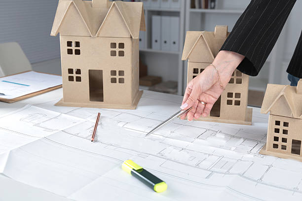 istock House plan blueprint and model  concept for new 629257554