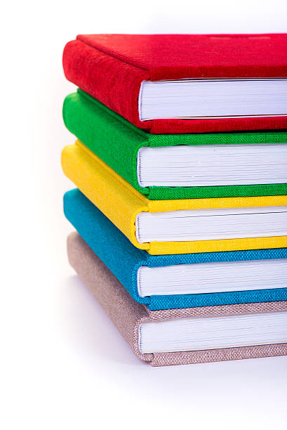 istock Multicolored book textile cover. Photobooks on a white background. 629257938
