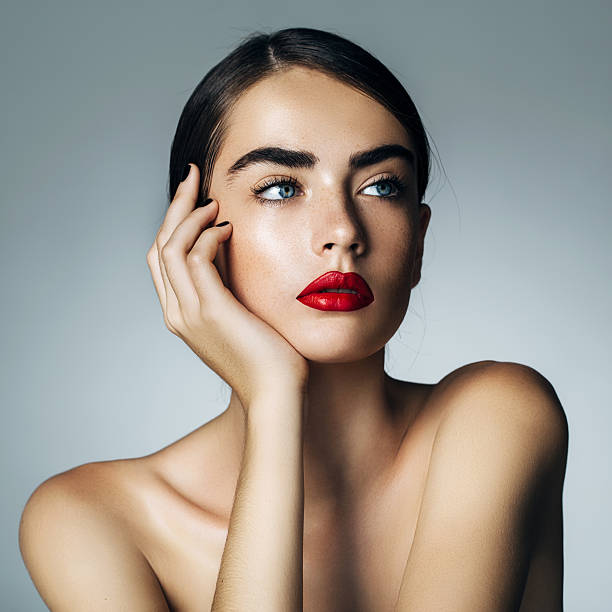 Studio shot of young beautiful woman