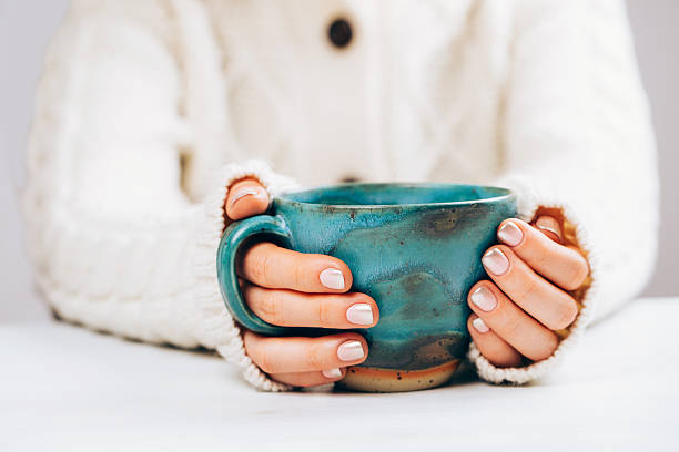 istock Woman with cup of hot coffee 629263722